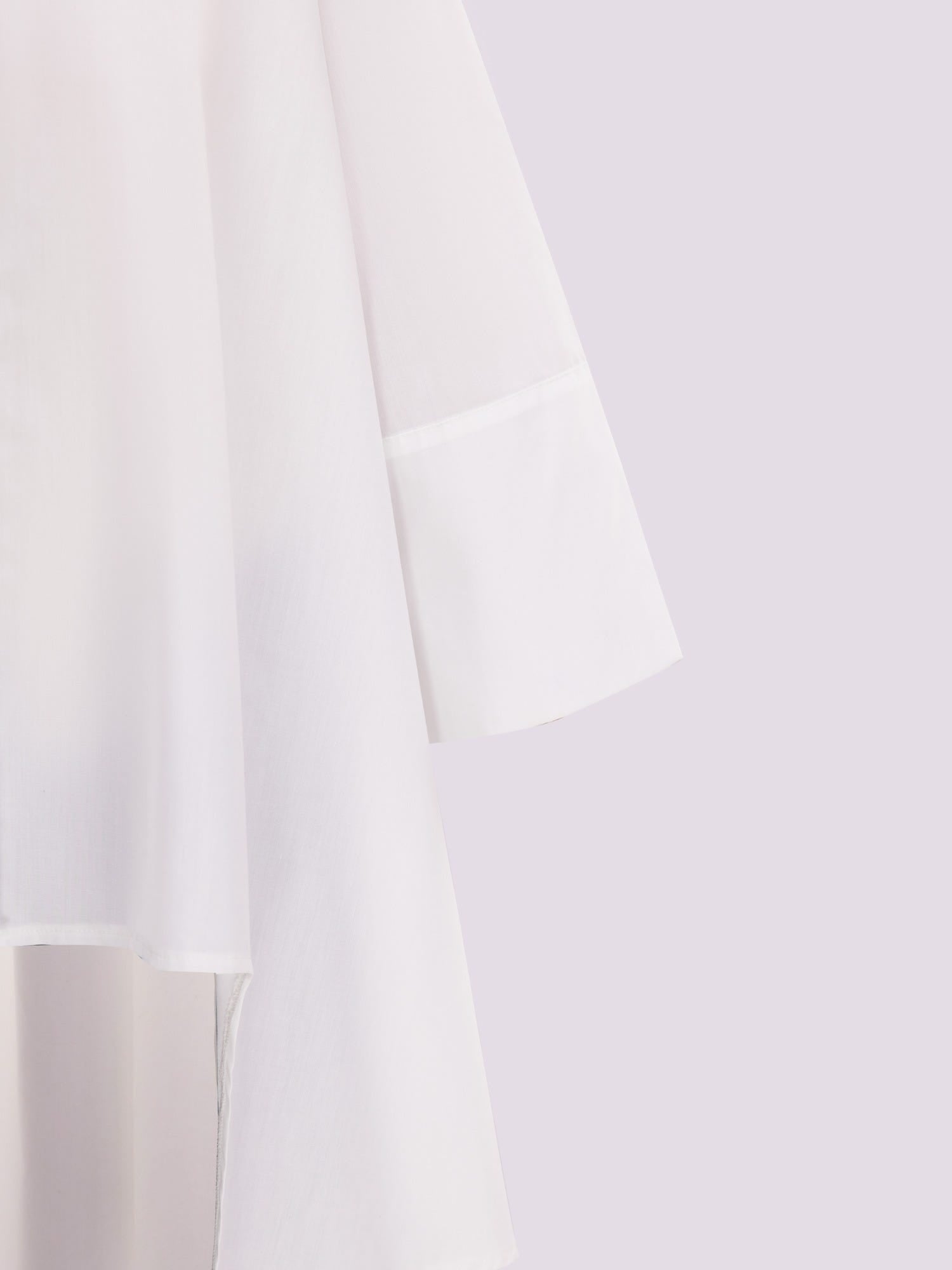 WHITE OVERSIZED ASYMMETRICAL SHIRT